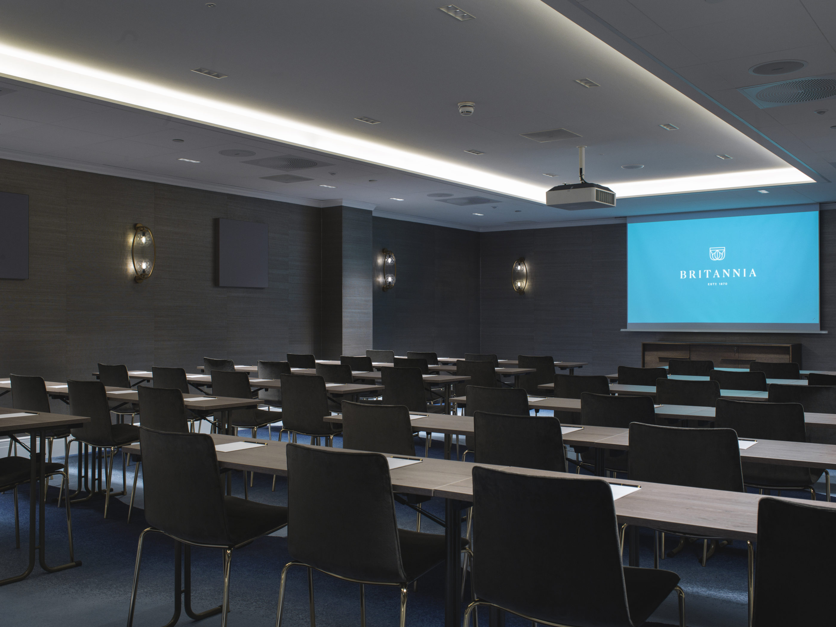 Margrete meeting conference room with classroom seating and big screen in front