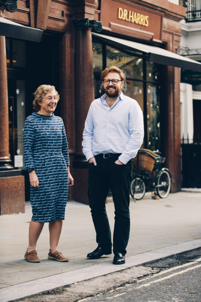 Dr. Alison Moore and Julian Moore outside D. R. Harris St James pharmacy.