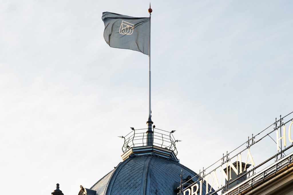 Britannia's flag atop its iconic domed tower