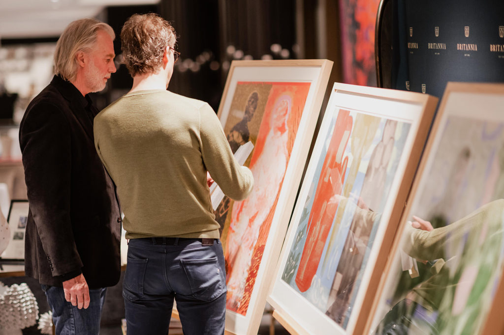 Visitors looking at the artwork at the opening Sverre Bjertnæs Britannia exhibition 2022.